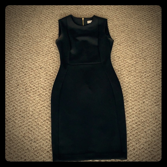 Calvin Klein Dresses & Skirts - Calvin Klein Black Dress with gold zipper, Size 2
